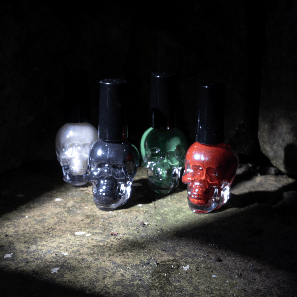 All 4 nail varnish colours stood up with a shadow effect.