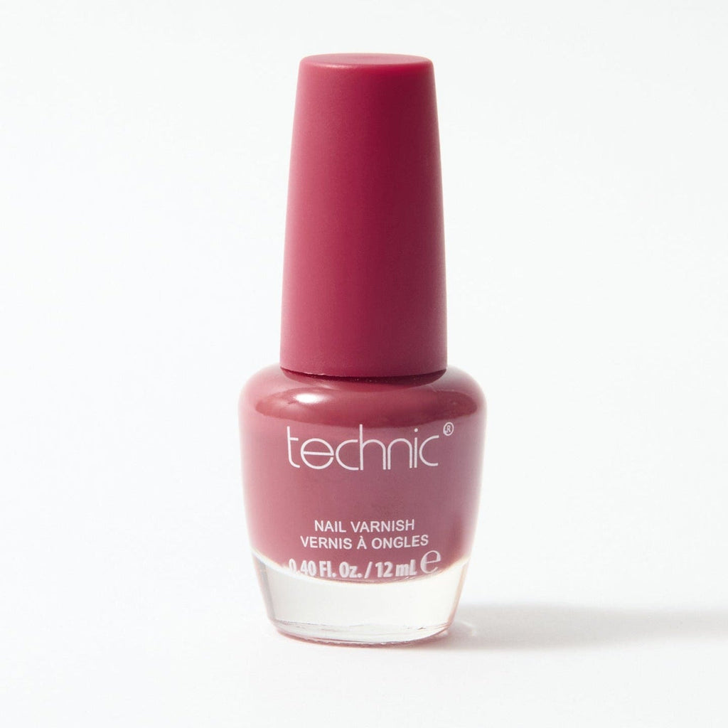 A bottle of nail varnish in the shade Sangria on a white background