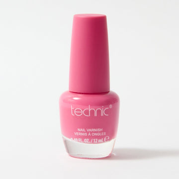 A bottle of nail varnish in the shade Candy on a white background