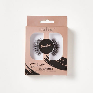 Luxe cashmere 3d lashes in the style Frankie in a rose gold box with black patterns on it, on a white background.