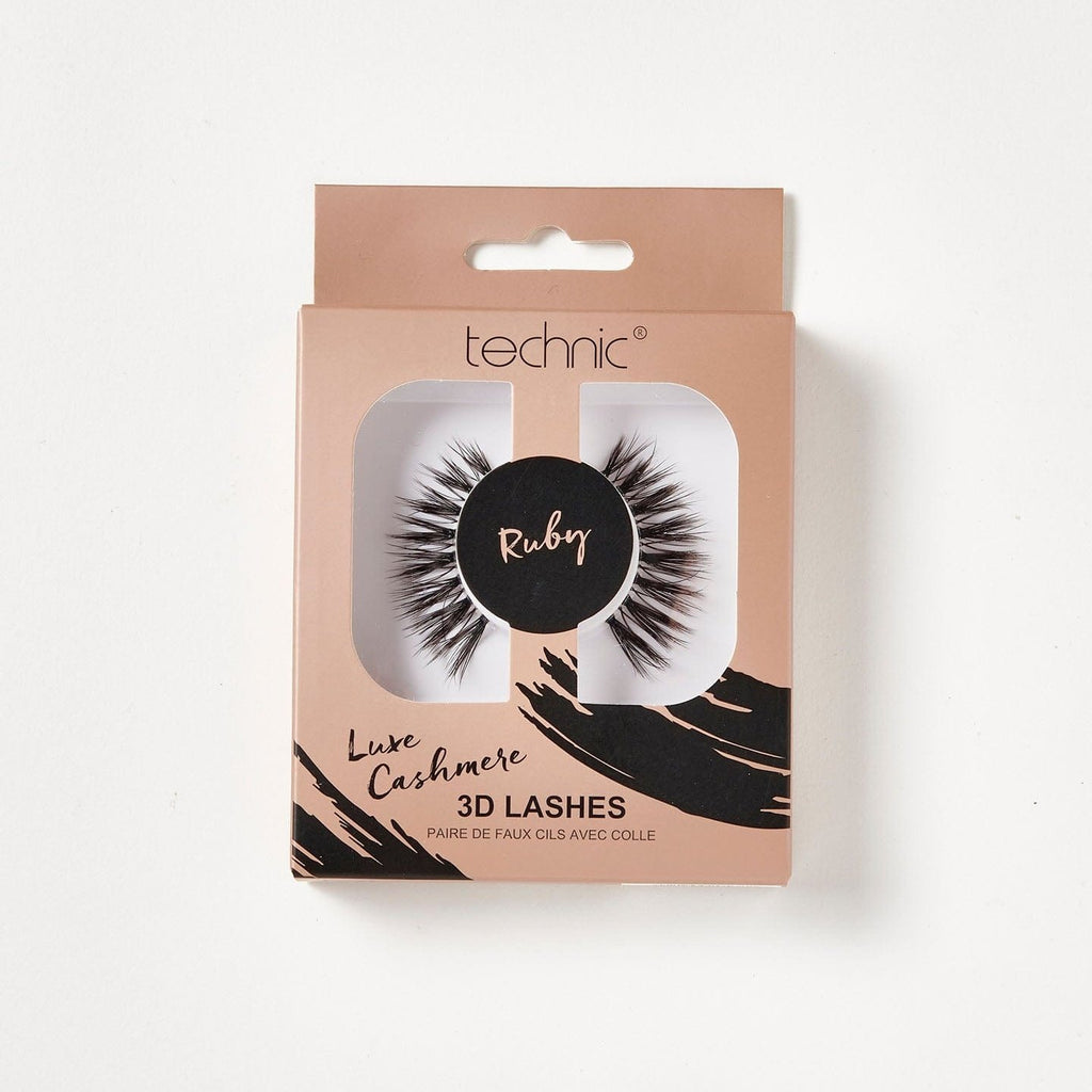 Luxe cashmere 3d lashes in the style Ruby in a rose gold both with black patterns on a white background.