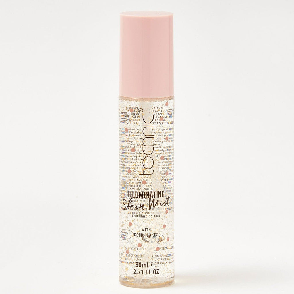 An illuminating skin mist in front of a white background.