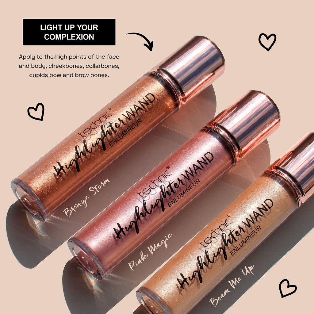 The 3 shades of the highlighter wand on a beige background in the sunlight.