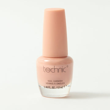 A bottle of nail varnish in the shade Toastie on a white background