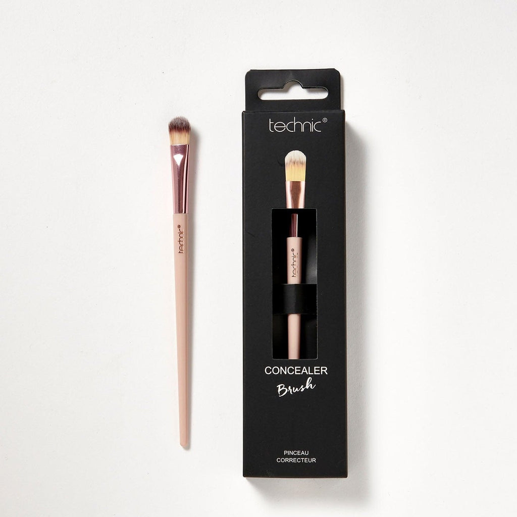 2 concealer brushes on a white background. 1 is in its original packaging which is black and has an image of he brush on the front, and the other is out of the packaging.