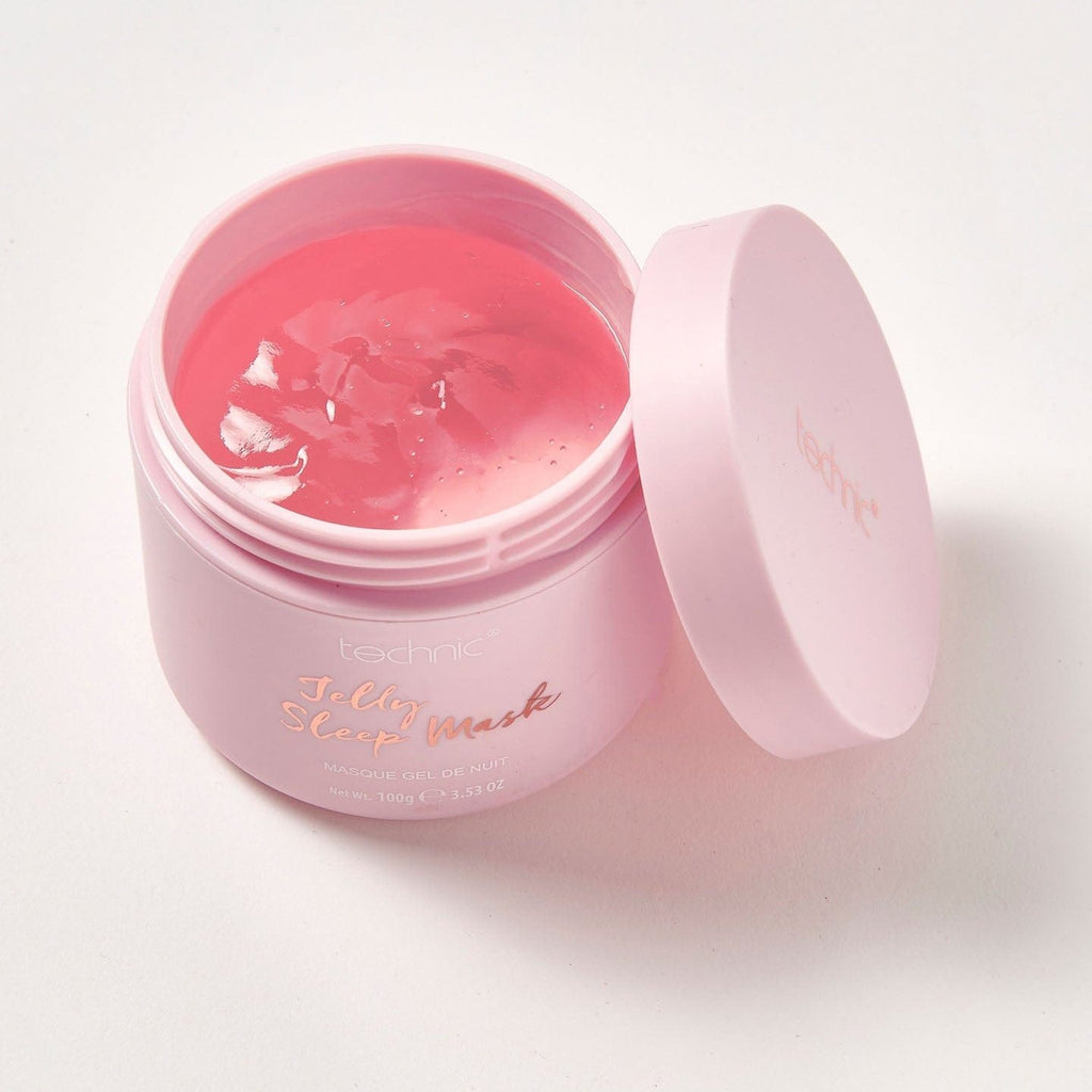 An opened jelly sleep mask on a white background. Its an overhead image and the lid is next to the product.