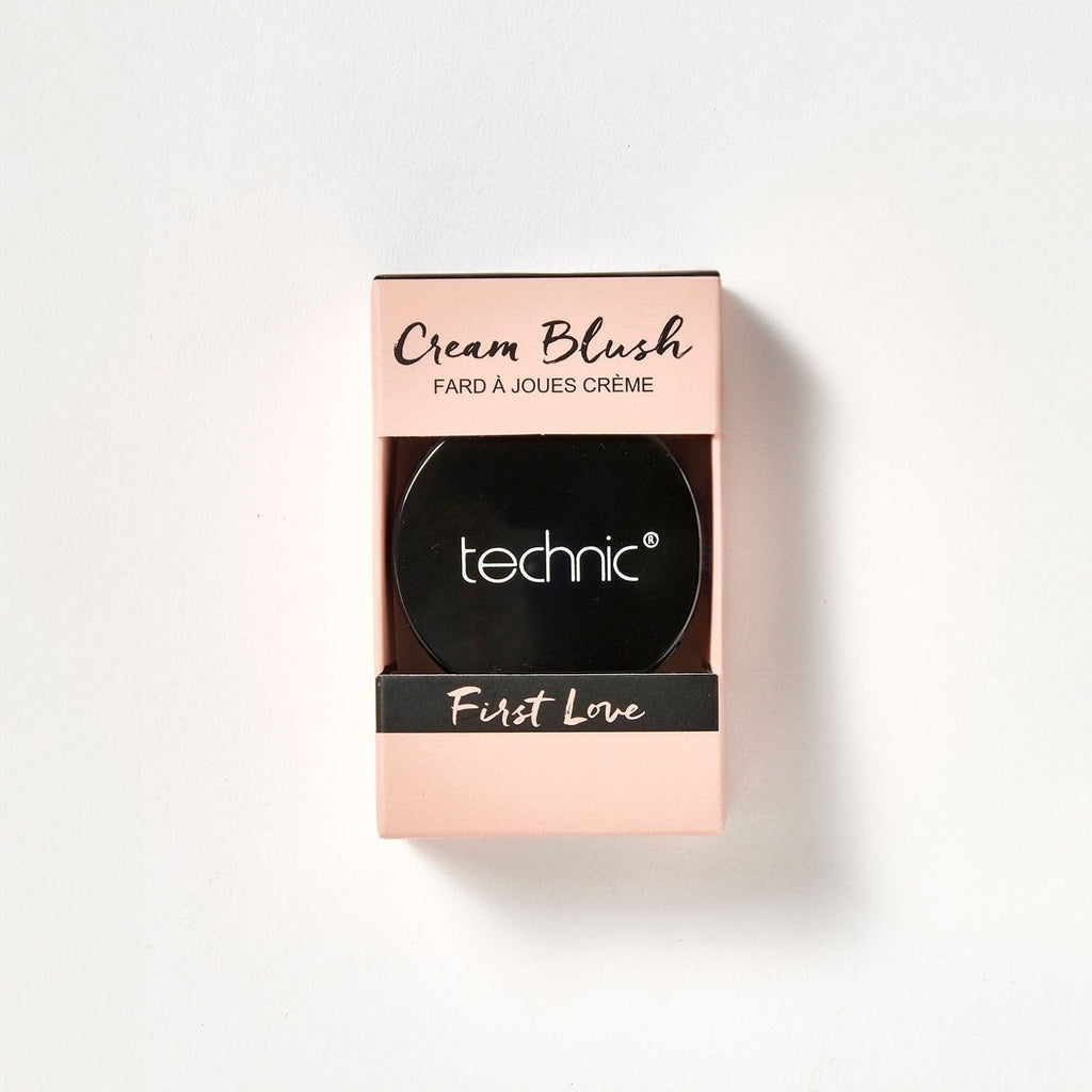 A cream blush in the shade First Love in its cream coloured box packaging on a white background.