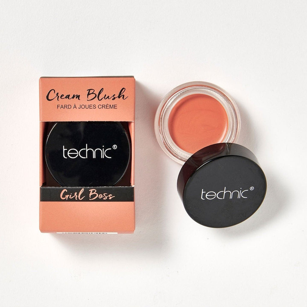 2 cream blushes in the shade Girl Boss next to each other on a white background. 1 is in its peach coloured box packaging and the other is opened.