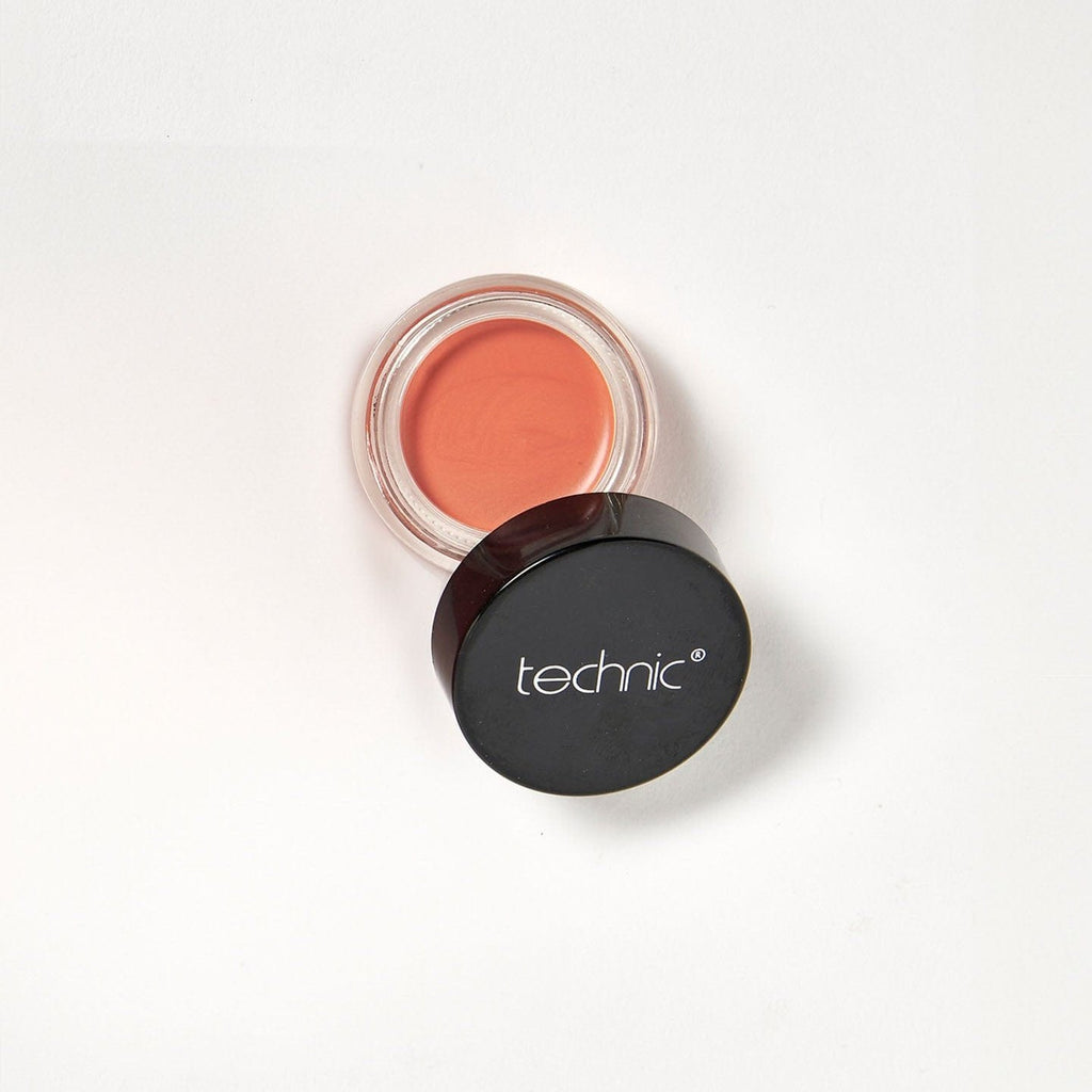 An opened cream blush in the shade Girl Boss on a white background.