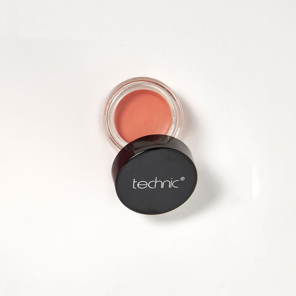 An opened cream blush in the shade Kiss Curl on a white background.