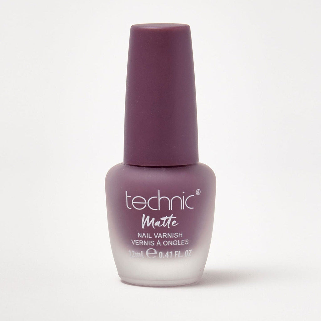 A bottle of matte nail varnish in the shade Back Grape on a white background