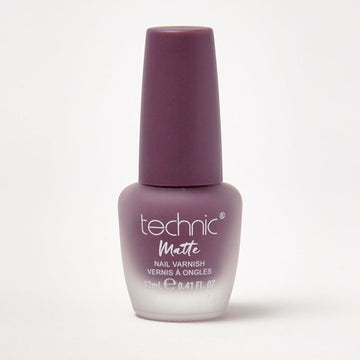 A bottle of matte nail varnish in the shade Back Grape on a white background