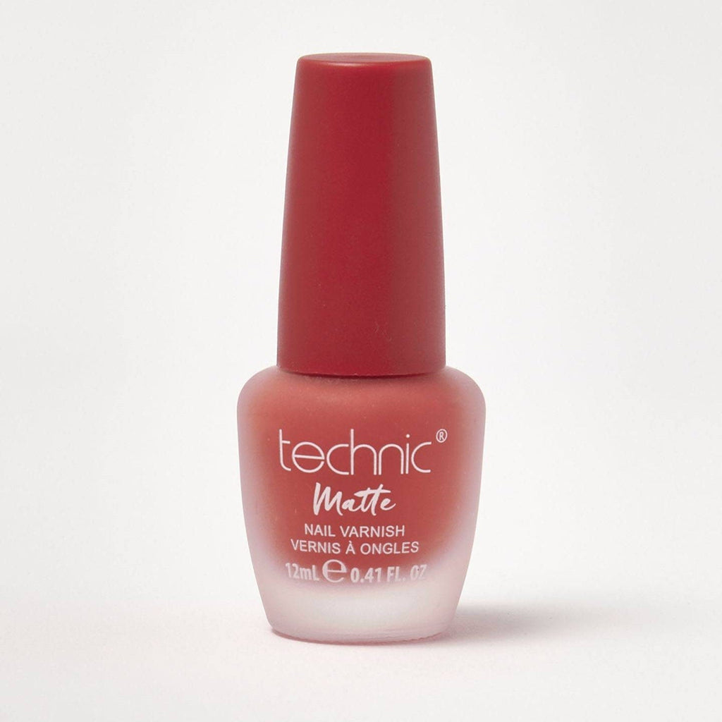 A bottle of matte nail varnish in the shade Pumpkin Spice on a white background