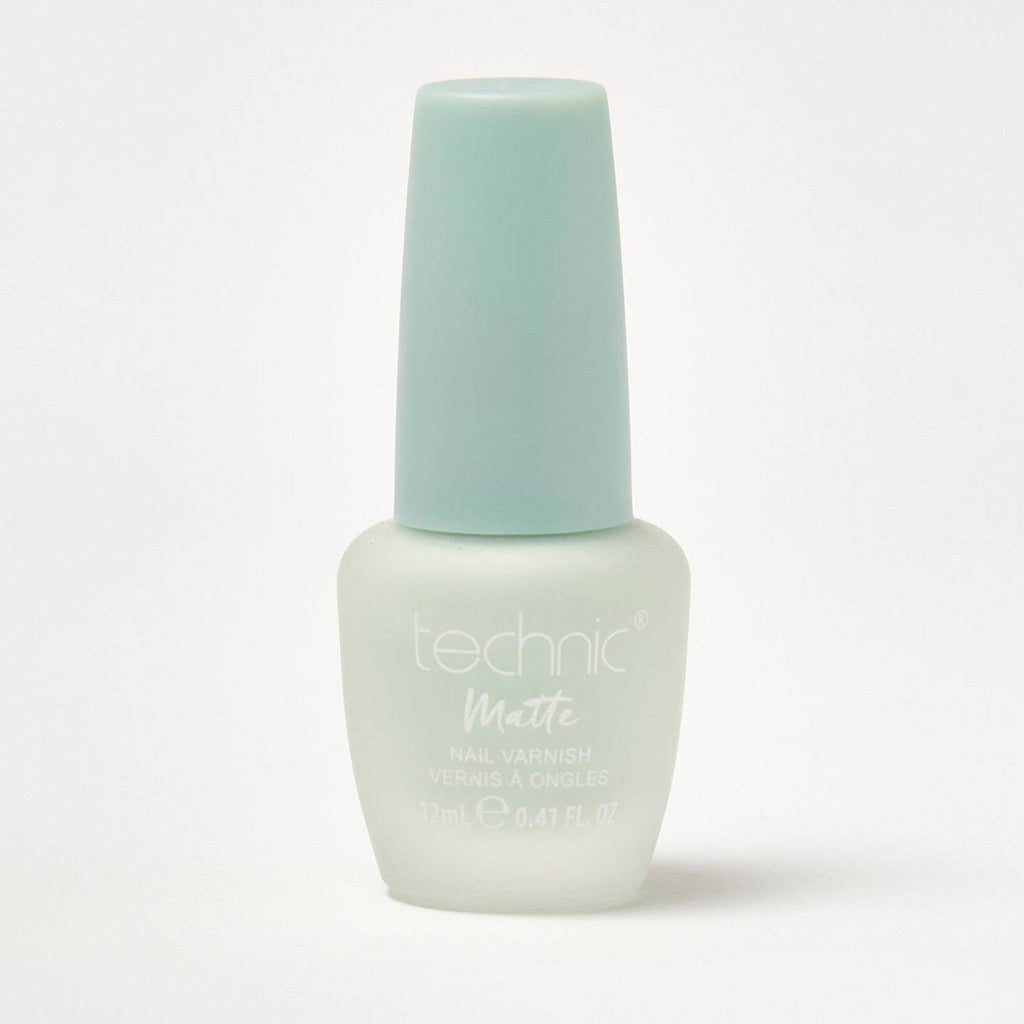 A bottle of pastel matte nail varnish in the shade Minty on a white background