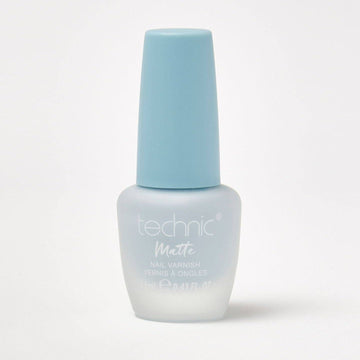 A bottle of pastel matte nail varnish in the shade Ocean on a white background