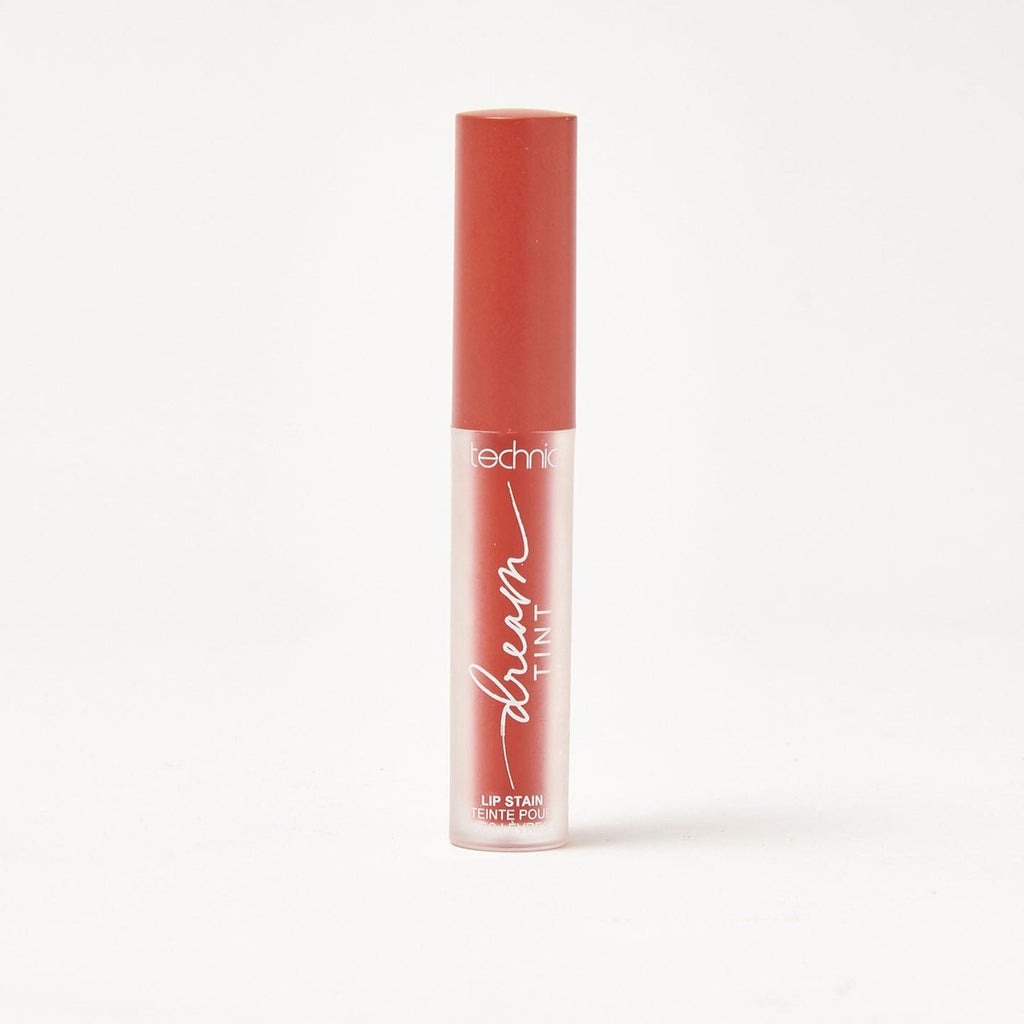 A dream lip tint in he shade Red Veil on a white background.
