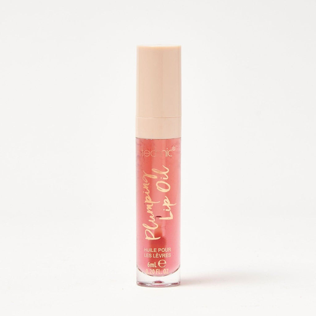 A plumping lip oil in the shade Chocolate Bombe on a white background.