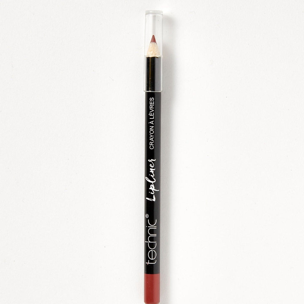 A wooden lip pencil in the shade Ginger Snap on a white background.