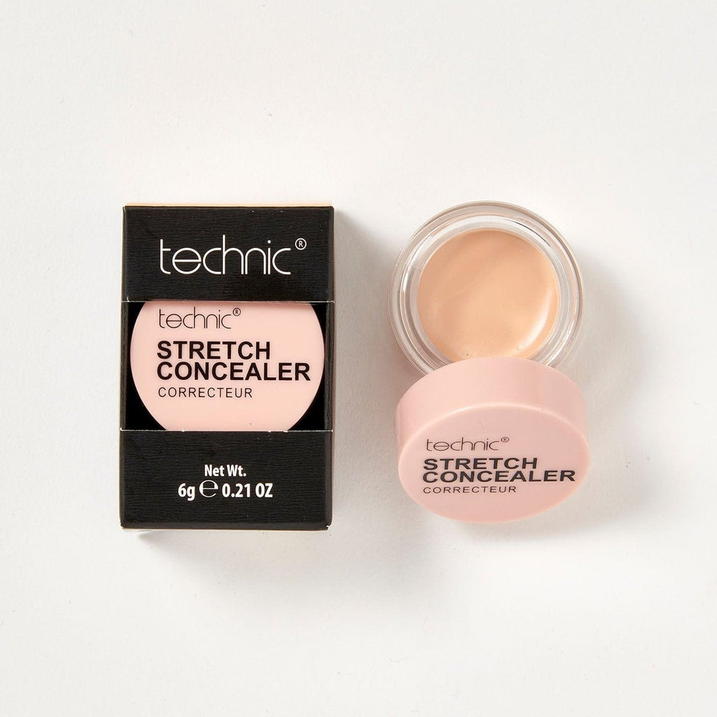 2 stretch concealers in the shade Beige next to each other on a white background. 1 is in it black coloured box packaging and the other is opened