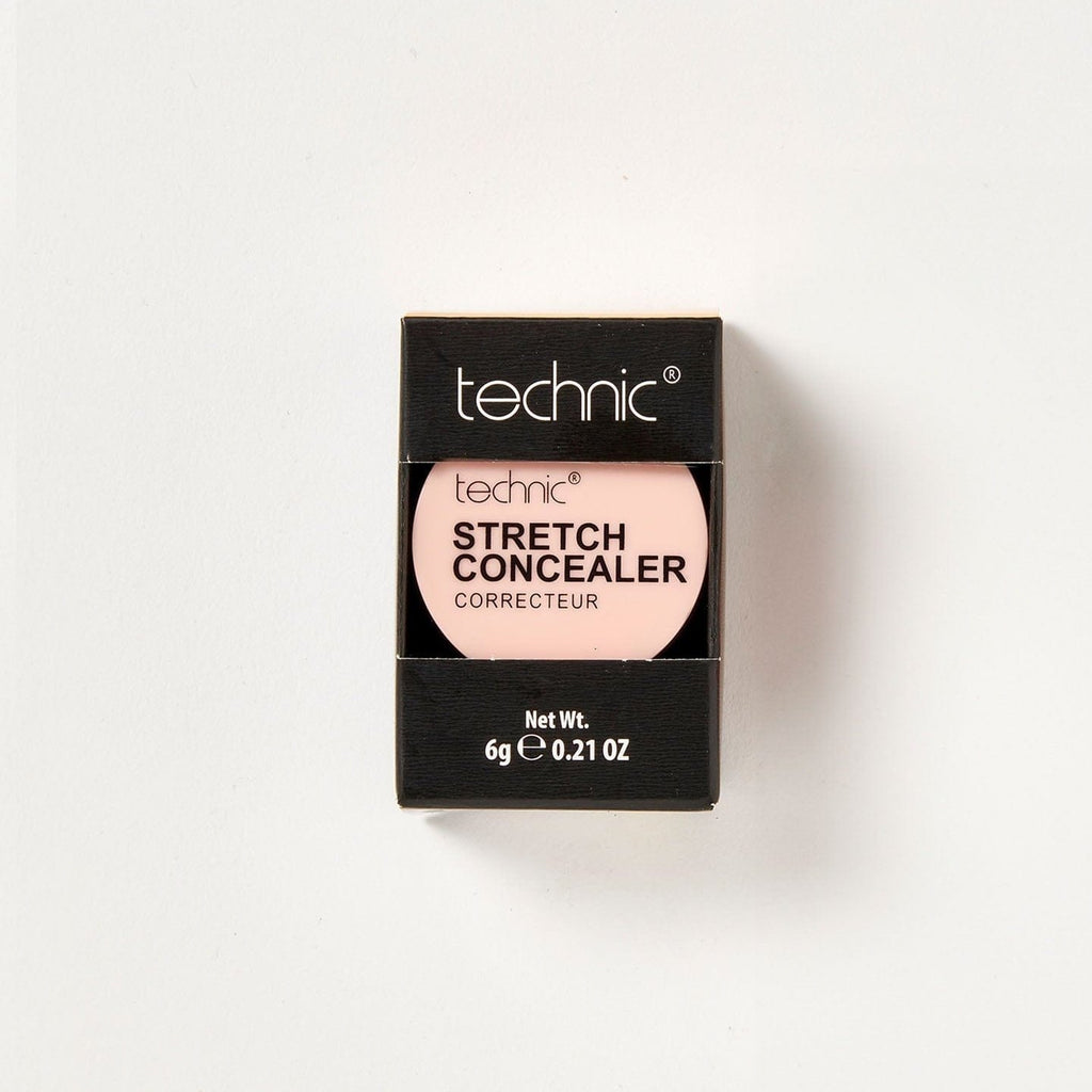 A stretch concealer in the shade Beige in its black coloured packaging on a white background.