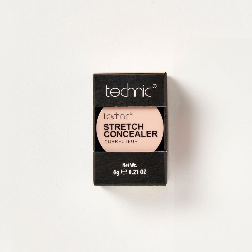 A stretch concealer in the shade Buff in its black coloured packaging on a white background.