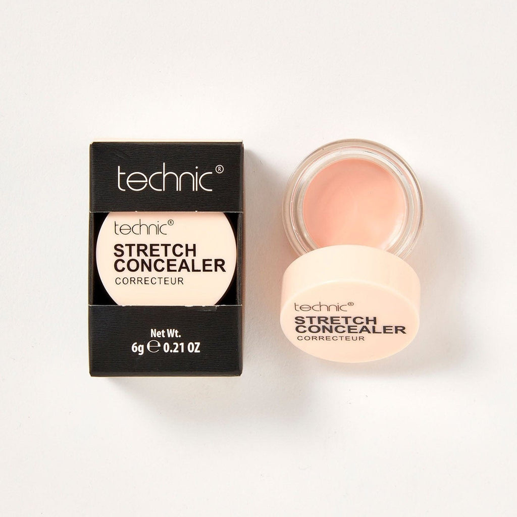 2 stretch concealers in the shade Fair next to each other on a white background. 1 is in it black coloured box packaging and the other is opened