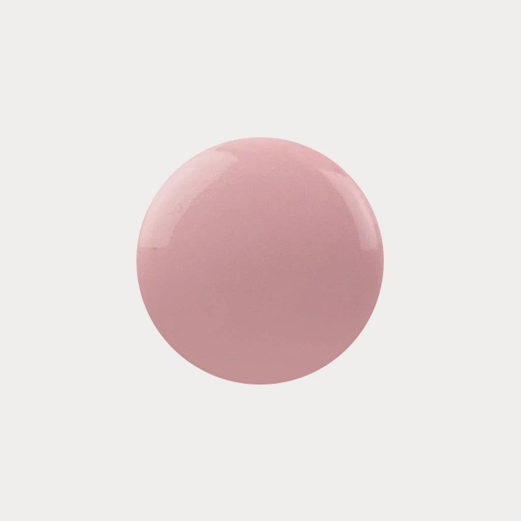 A swatch of the shade Bubblegum. It is a pastel baby pink colour