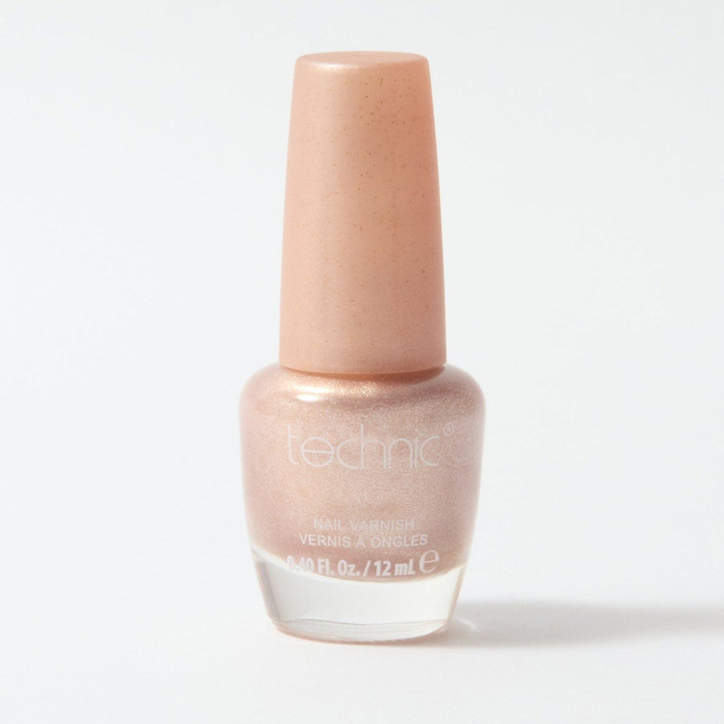 A bottle of shimmer nail varnish in the shade Seashell on a white background