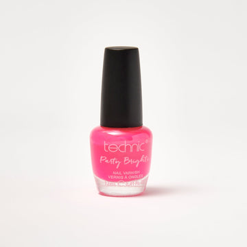 A nail varnish bottle in the shade Flamingo in front of a white background.
