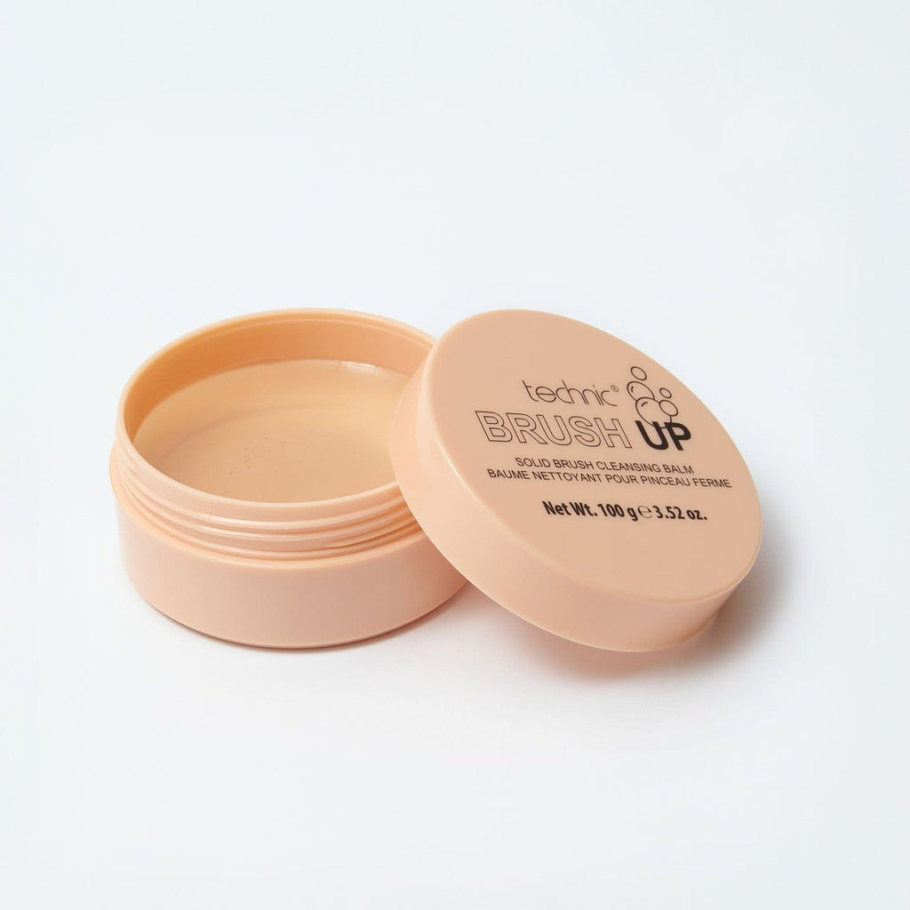 An opened brush up blush cleaner on a white background.