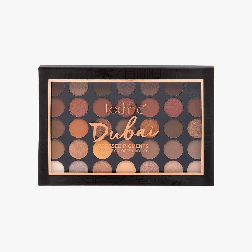 The Dubai pressed pigment palette on a white background.