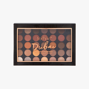 The Dubai pressed pigment palette on a white background.