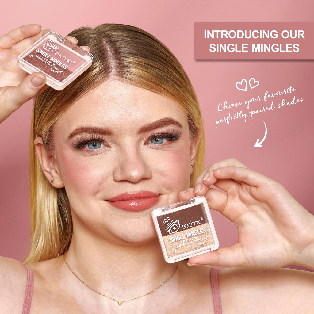 A model holding 2 of the eyeshadows above and below her face. 