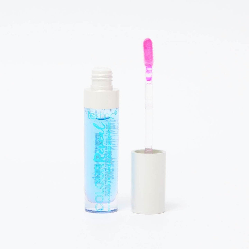 An opened colour reveal lip oil in the shade Cool Vibes in front of a white background.