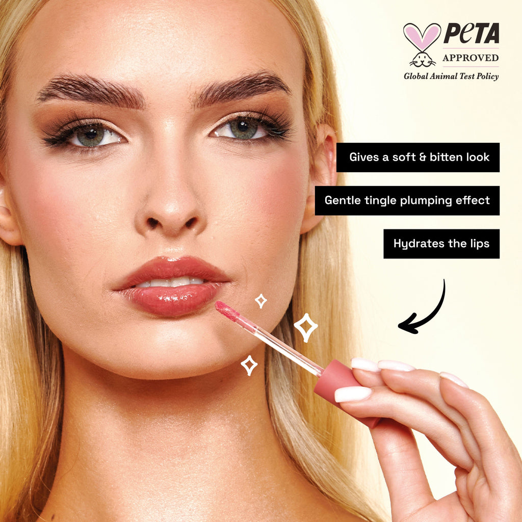 Close up of model applying the lip tint with an arrow with text saying that it gives a soft and bitten look, has a gentle tingle effect and hydrates the lips.