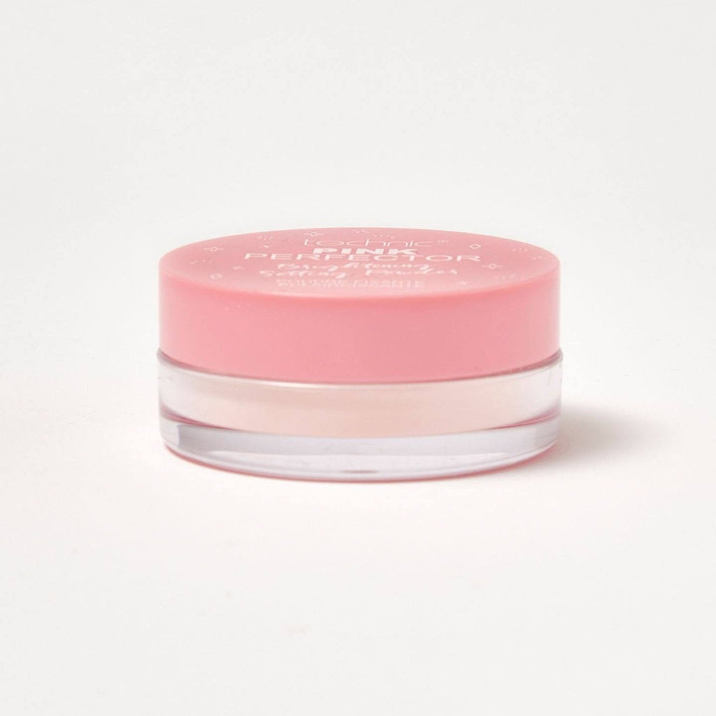 The pink perfector powder from the side in front of a white background.