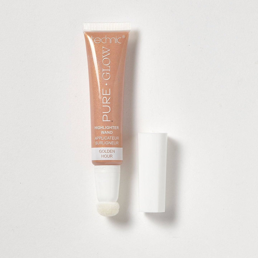 An opened highlighter wand in the shade Golden Hour on a white background.