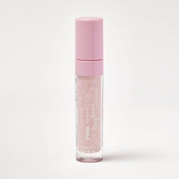 A pink perfector concealer on a white background.