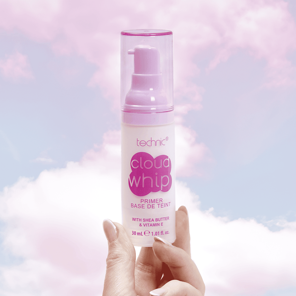 A models hand holding the cloud whip primer in front of a cloud background.