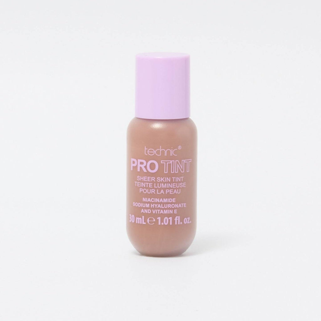 A pro tint in the shade Cinnamon Mocha in front of a white background.