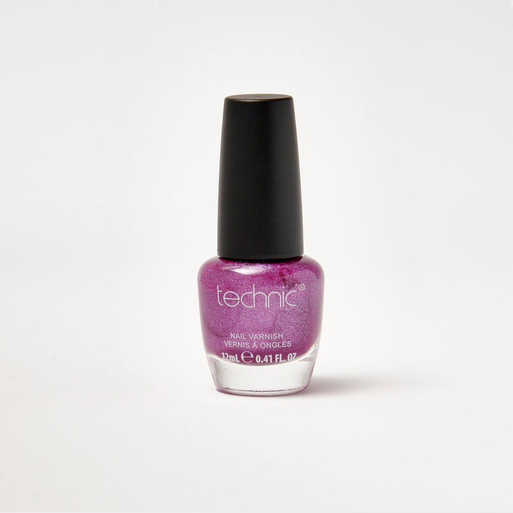 A nail varnish bottle in the shade Violet in front of a white background.