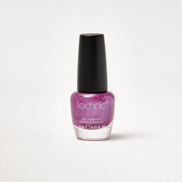 A nail varnish bottle in the shade Violet in front of a white background.