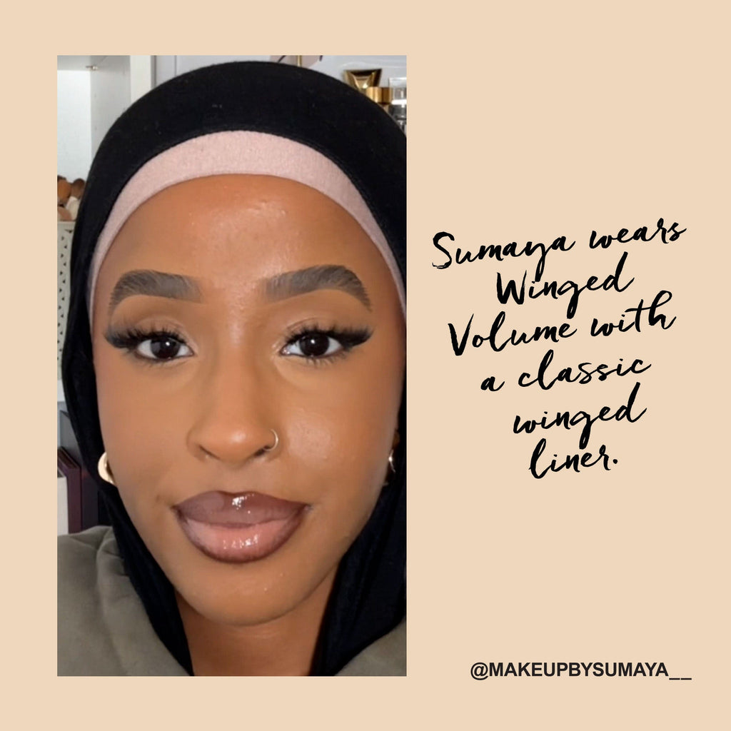 Model wearing the elastic lashes in the style Winged Volume with a classic winged liner.