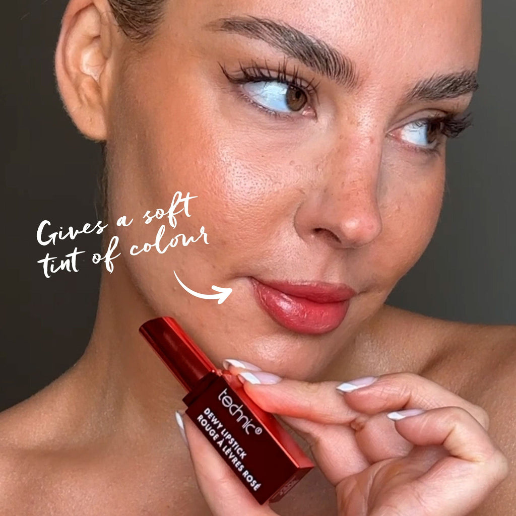 Model holding a dewy lipstick in the shade Like A Boss with text saying "gives a soft tint of colour"
