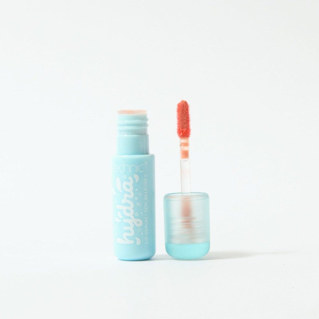 An opened hydra lip serum on a white background.