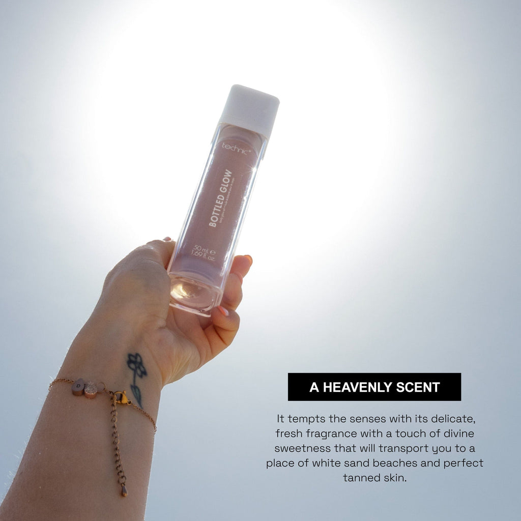 A bottled glow being held up to the sky. Text saying that this product has a heavenly, sweet scent that reminds you of holidays.