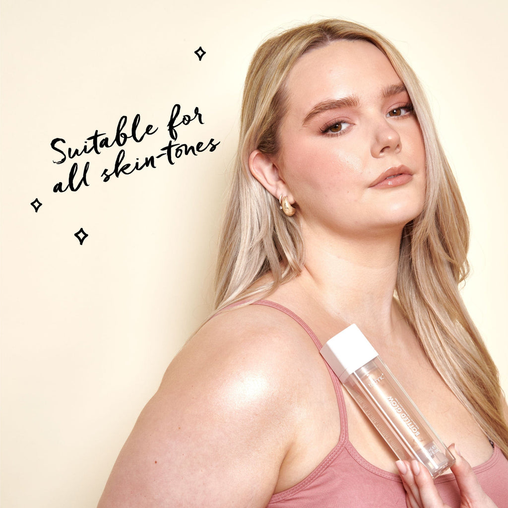 A model holding the bottled glow against her chest with text saying it is suitable for all skin tones.