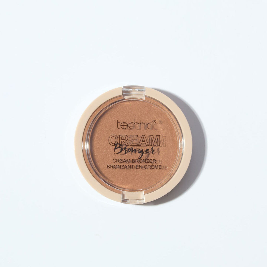 A cream bronzer in the shade Medium on a white background.