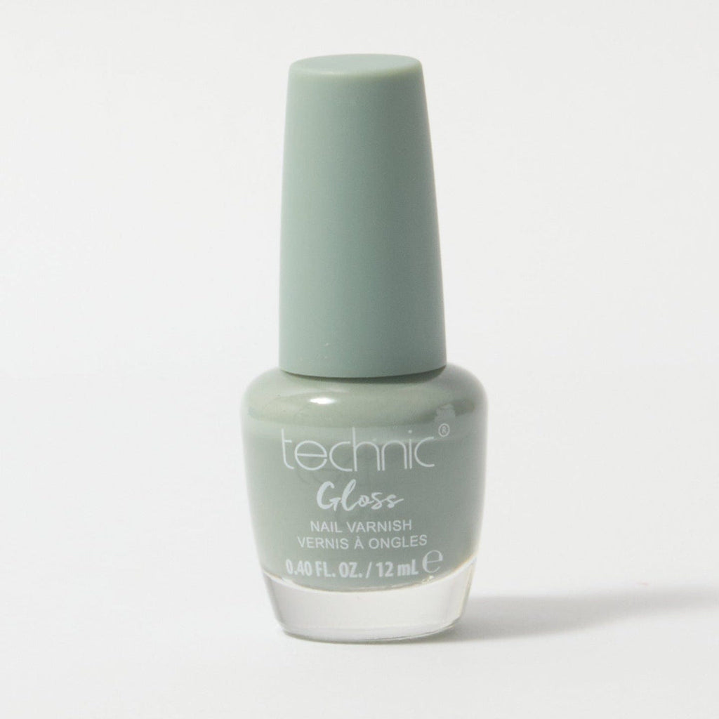 A bottle of gloss nail varnish in the shade Sage on a white background. It is a greeny grey colour.