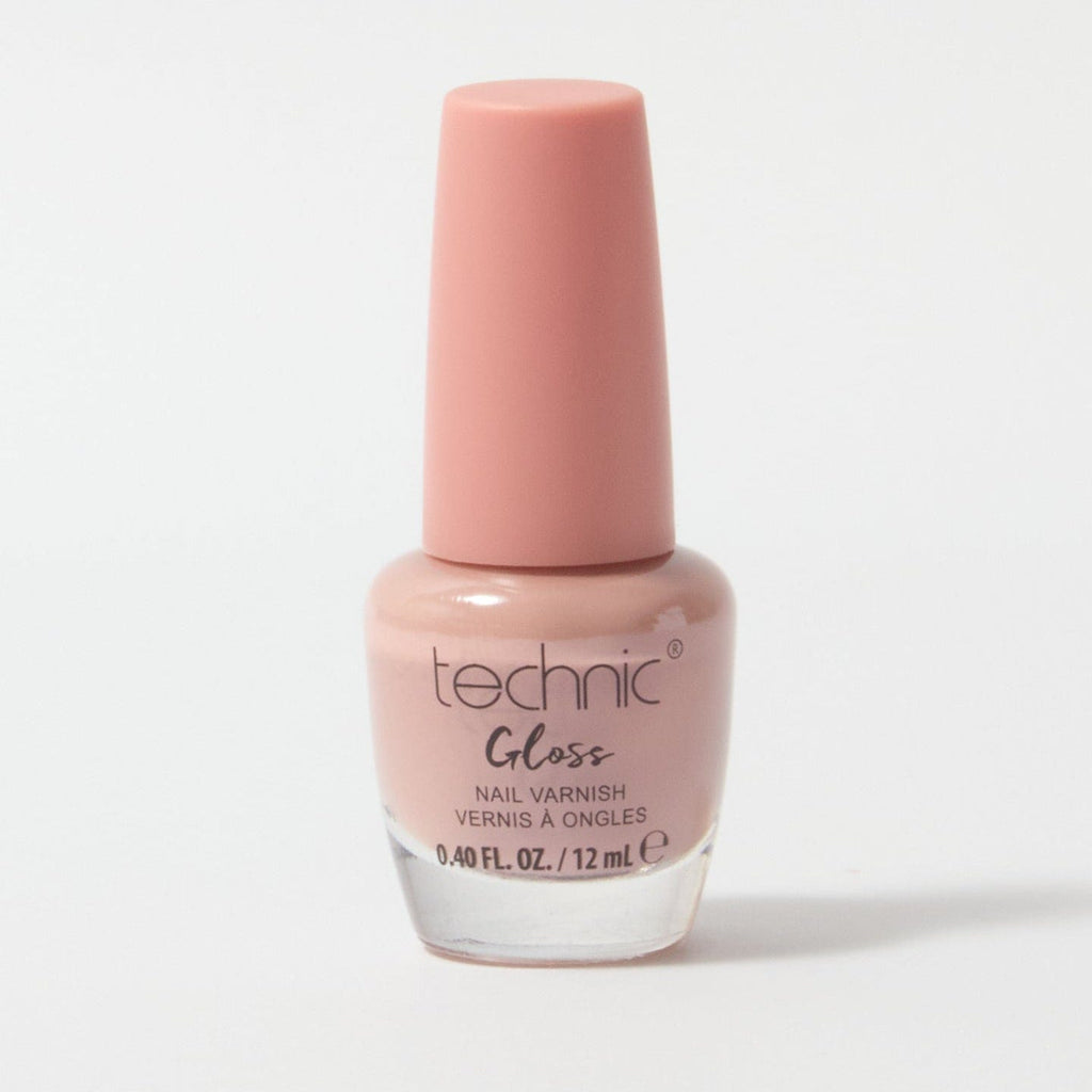 A bottle of gloss nail varnish in the shade Pink Clay on a white background